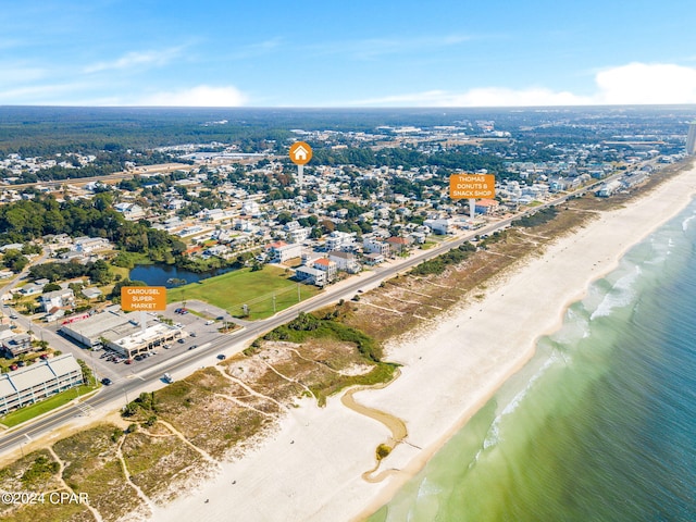 aerial view featuring a view of the beach and a water view