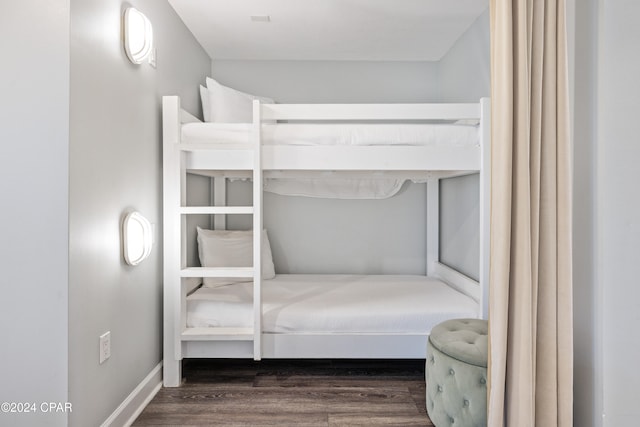 bedroom featuring dark hardwood / wood-style floors