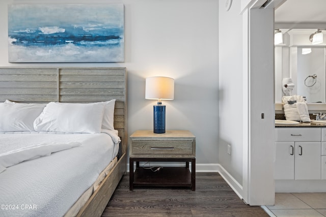 bedroom featuring dark wood-type flooring