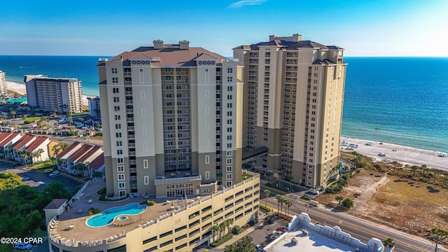 aerial view with a beach view and a water view