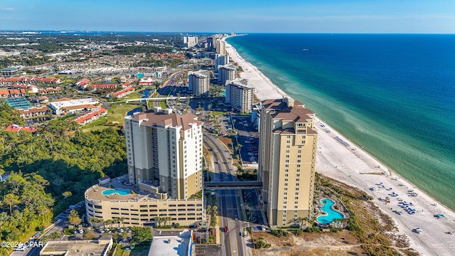 drone / aerial view with a view of the beach and a water view