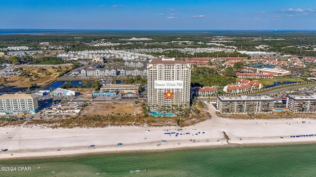 drone / aerial view with a water view and a view of the beach