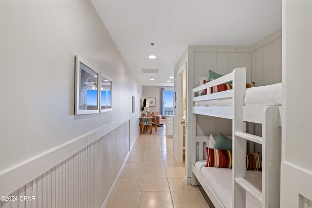 bedroom with light tile patterned floors