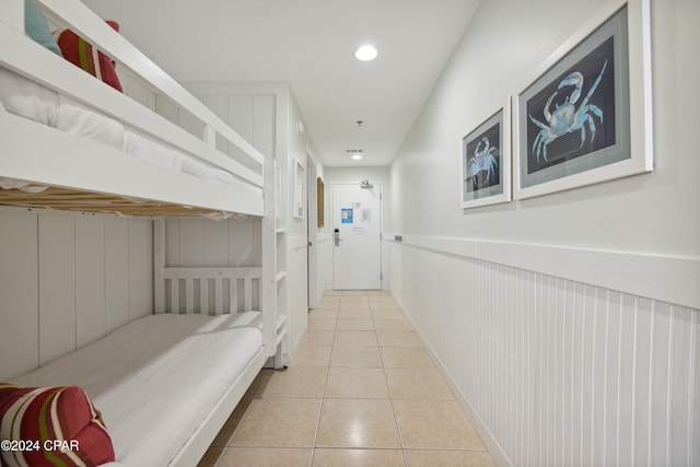 bedroom featuring light tile patterned flooring