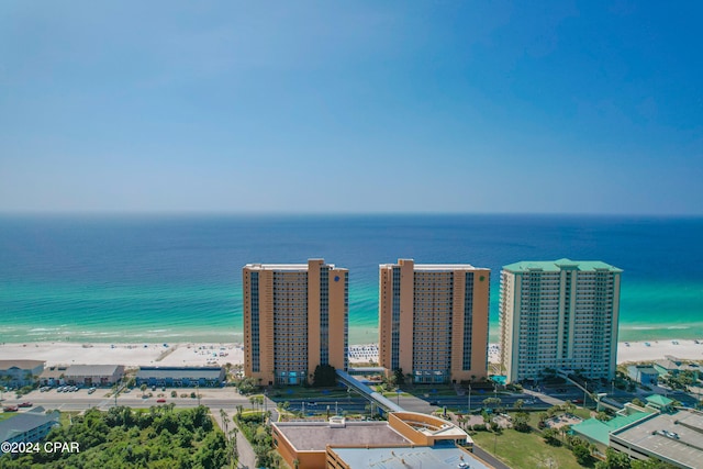 bird's eye view featuring a beach view and a water view