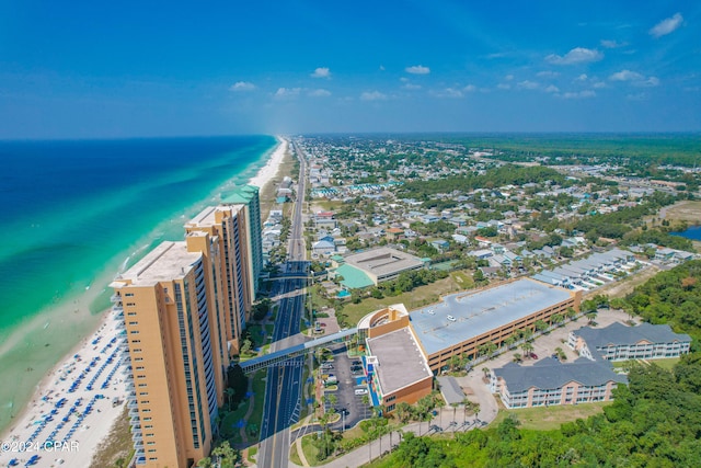 bird's eye view with a view of the beach and a water view