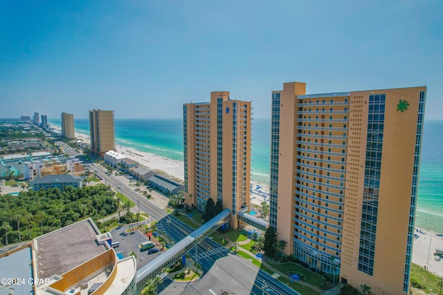 drone / aerial view with a view of the beach and a water view