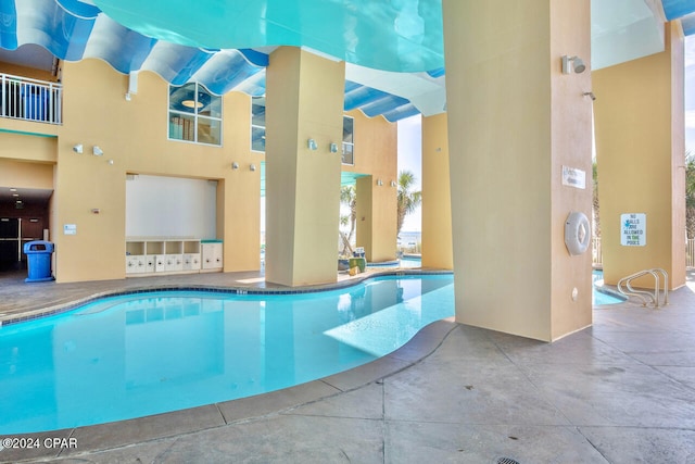 view of pool with a patio