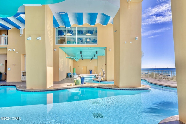 view of pool featuring a patio area