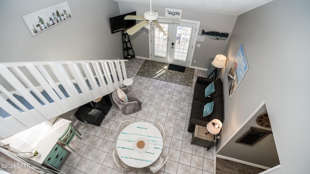 living room featuring french doors, vaulted ceiling, and ceiling fan