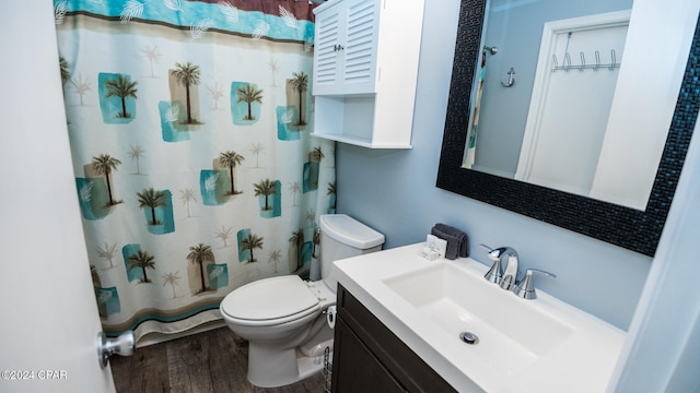 bathroom with vanity, toilet, wood-type flooring, and a shower with shower curtain