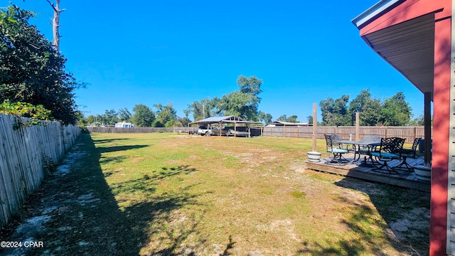 view of yard with a gazebo and a deck