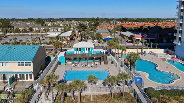 birds eye view of property featuring a water view and a view of the beach