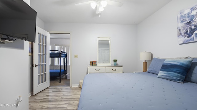 bedroom featuring ceiling fan and light hardwood / wood-style floors