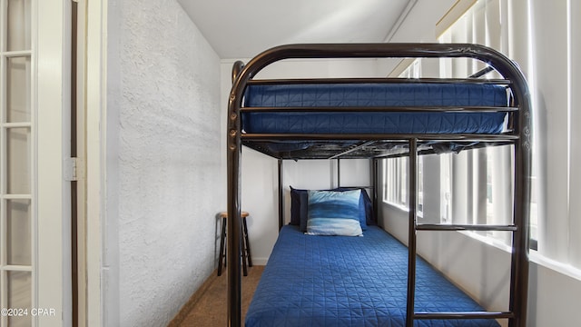 bedroom featuring carpet flooring