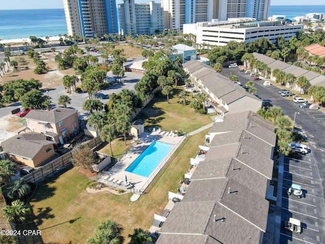 birds eye view of property with a water view