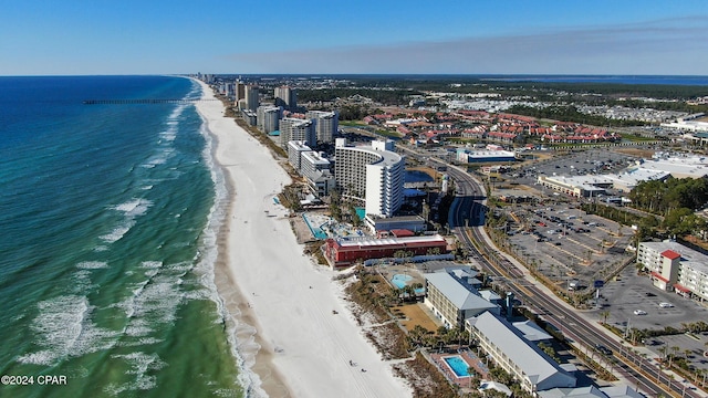 aerial view featuring a water view and a beach view