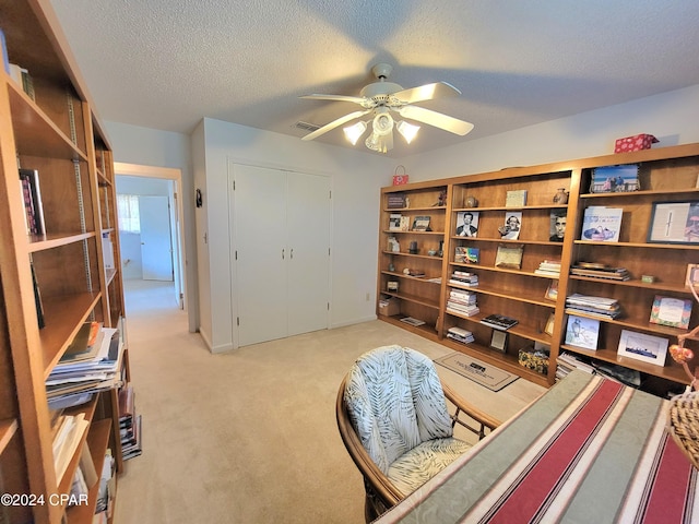 17680 Margaret St, Blountstown, FL 32424 - interior space with visible vents, ceiling fan, light colored carpet, and a textured ceiling