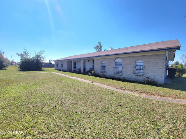 17680 Margaret St, Blountstown, FL 32424 - ranch-style house featuring a front yard