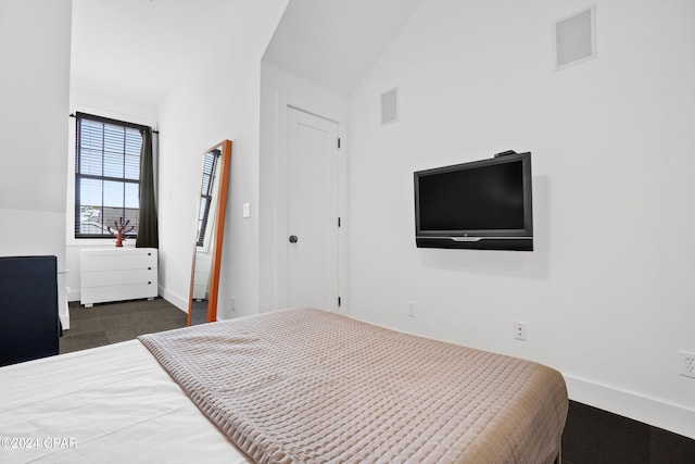 bedroom with connected bathroom and ceiling fan