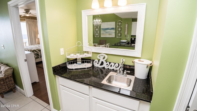 bathroom with vanity, tile patterned floors, and ceiling fan