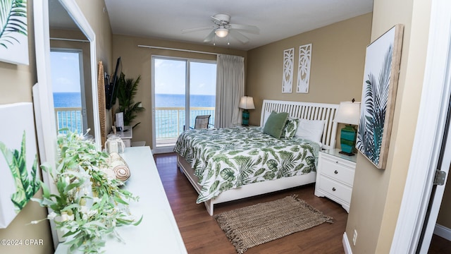 bedroom with dark hardwood / wood-style flooring, access to outside, and ceiling fan