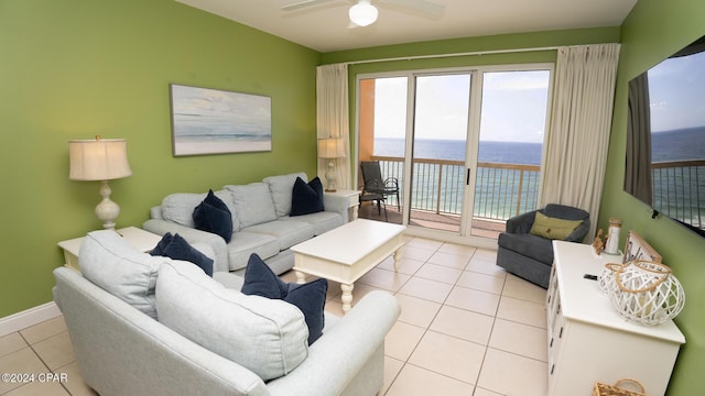 15817 Front Beach Rd Unit 1-906, Panama City Beach, FL 32413 - living room with light tile patterned flooring, a water view, ceiling fan, and healthy amount of natural light