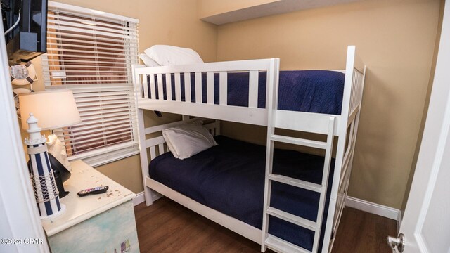 15817 Front Beach Rd Unit 1-906, Panama City Beach, FL 32413 - bedroom with wood finished floors and baseboards