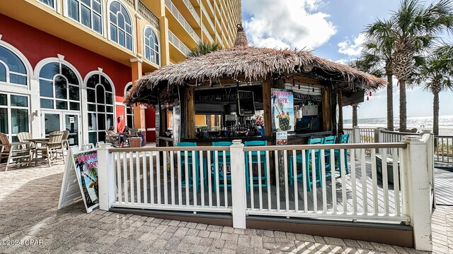 15817 Front Beach Rd Unit 1-906, Panama City Beach, FL 32413 - view of patio with a water view and a gazebo