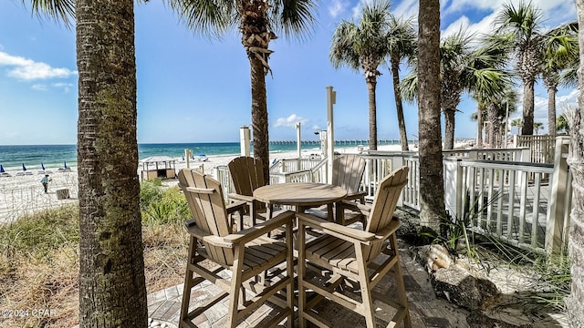 exterior space with a beach view and a water view