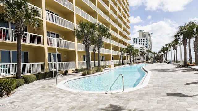 view of pool with a patio