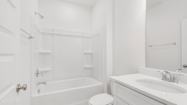 full bathroom with toilet, vanity, and shower / bath combination