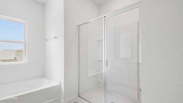 bathroom with independent shower and bath