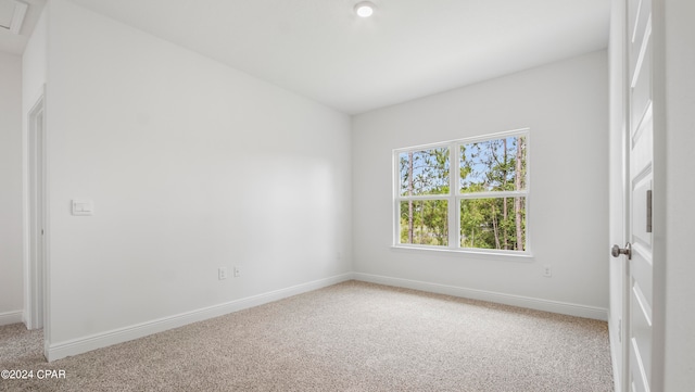 unfurnished room featuring carpet floors