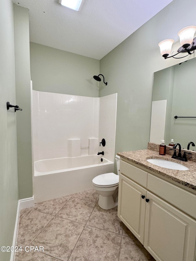 full bathroom with tile patterned floors, vanity, toilet, and shower / washtub combination