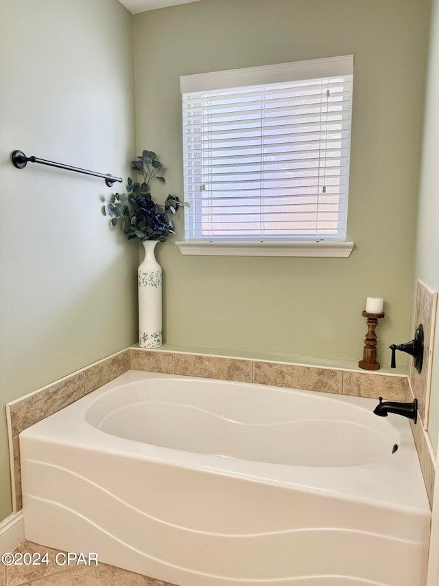 bathroom featuring a tub to relax in