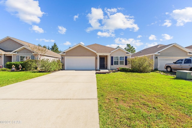 single story home featuring a garage and a front yard