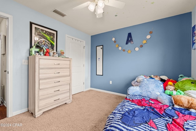 carpeted bedroom with ceiling fan