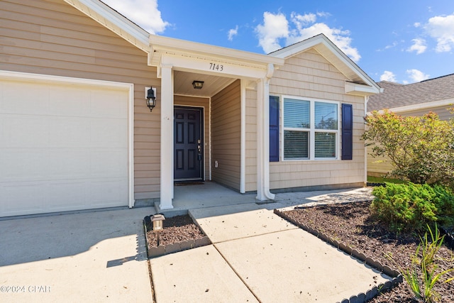 entrance to property with a garage