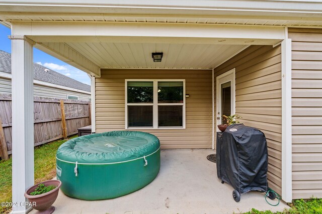 view of patio featuring a grill