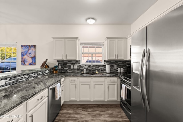 kitchen featuring sink, white cabinetry, and stainless steel appliances