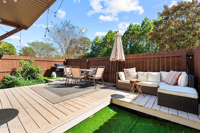 deck with outdoor lounge area