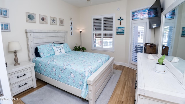 bedroom featuring light wood-type flooring