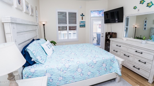 bedroom with light hardwood / wood-style flooring