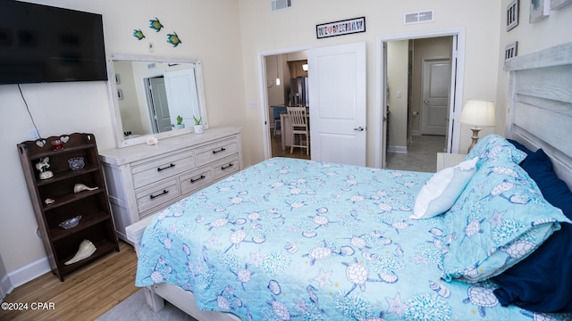 bedroom featuring hardwood / wood-style flooring