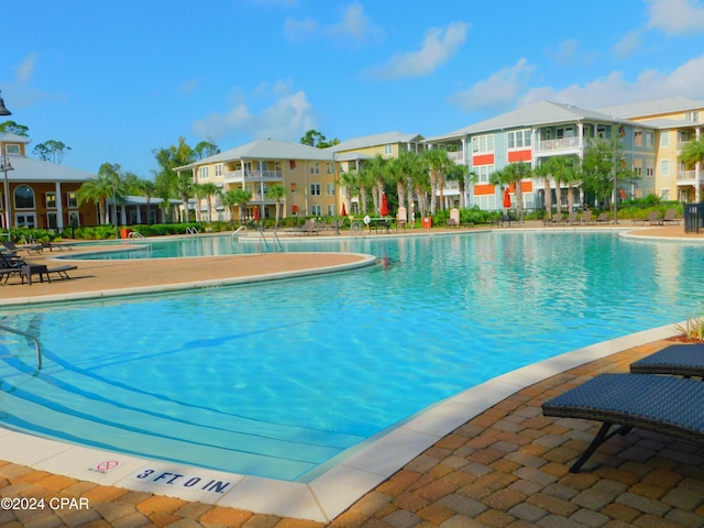 view of pool featuring a patio area