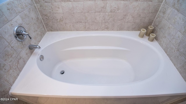 full bathroom with a garden tub