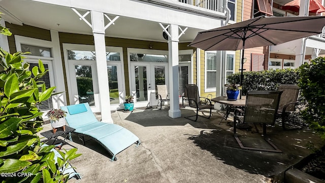 view of patio featuring french doors