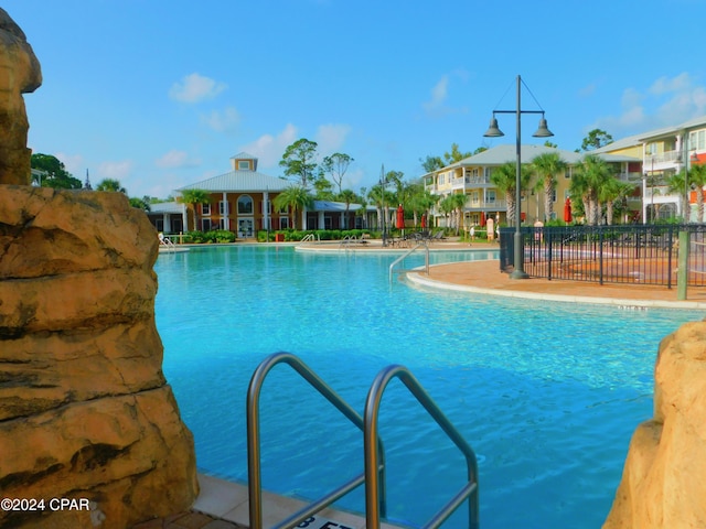 pool featuring fence