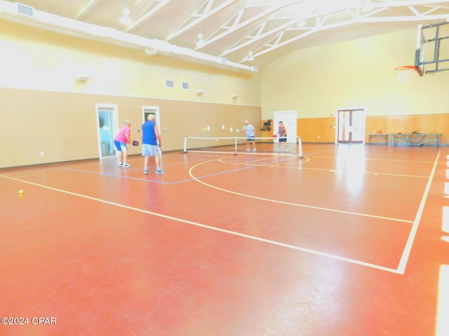 view of basketball court with a tennis court and community basketball court